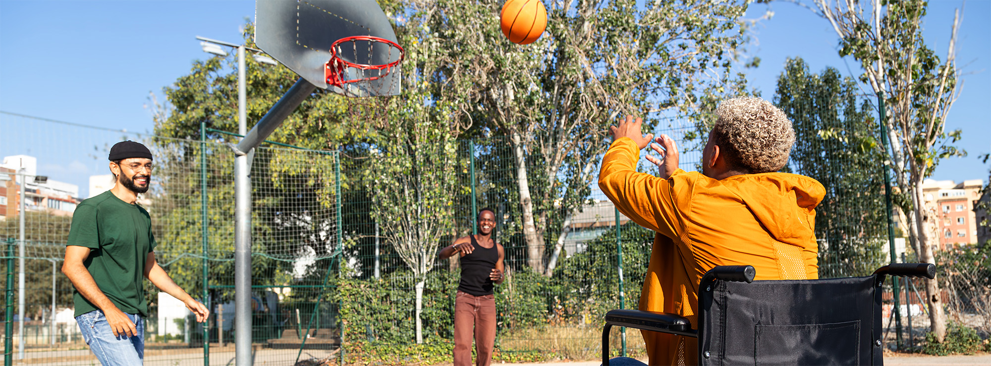 group playing basketball